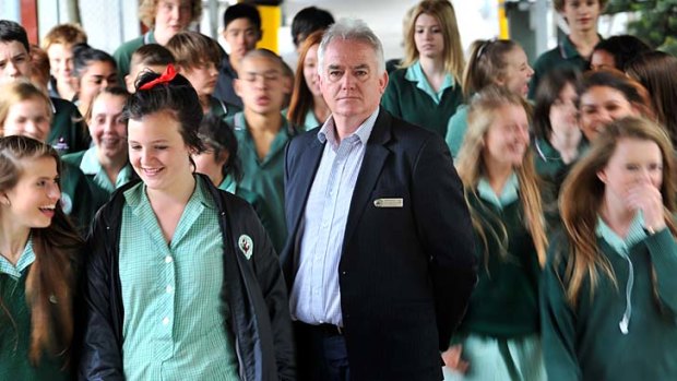 Packing them in: Ringwood Secondary College principal Michael Phillips with pupils at the school.