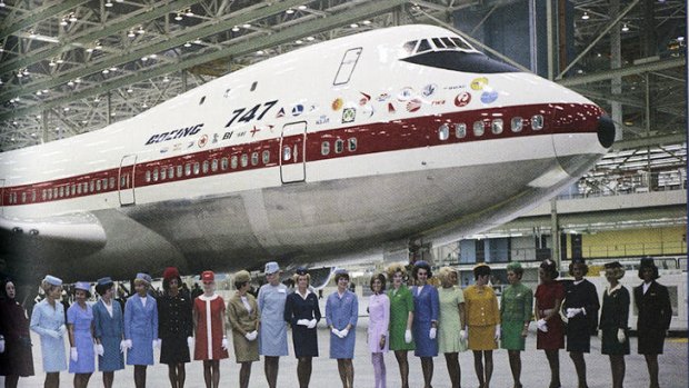 From " the Flight Attendant's shoe". This photo from 1968 shows flight hostesses representing the 26 airlines who placed orders for the Boeing 747Qantas flight hostess Pat tutor wearing Aqua is in the middle.