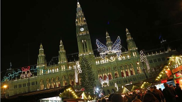 People gather at a Christmas market, in front of the "Rathaus" townhall of in Vienna. The tourist mecca has been named as the city with the world's best quality of life by consultant group Mercer.