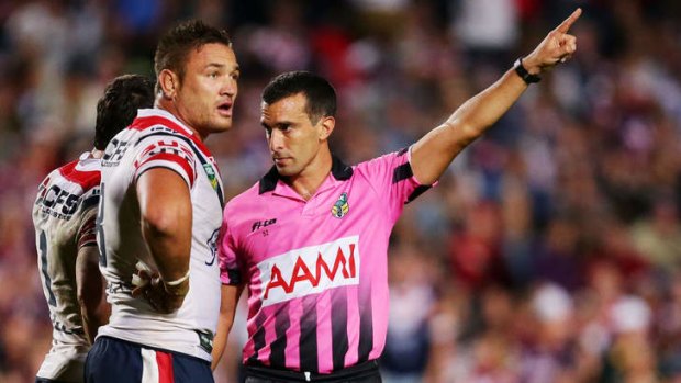 On his way: Jared Waerea-Hargreaves was sent off by referee Matt Cecchin after a bruising encounter with Manly's George Rose (above) in May.