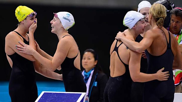 The Australia team cannot believe it after winning gold.