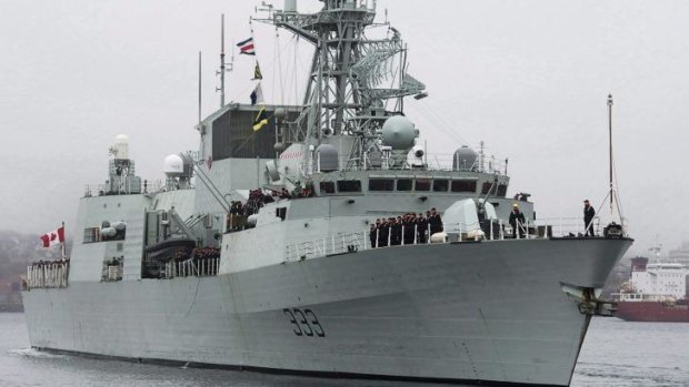 The HMCS Toronto heads out of the harbour in Halifax, Nova Scotia.
