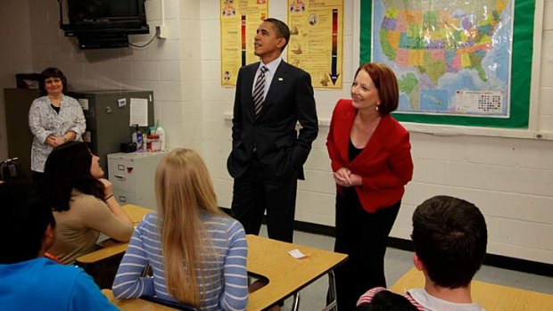 Prime Minister Julia Gillard spotted a photo of President Obama when she and Mr Obama took questions from students at Wakefield High School.