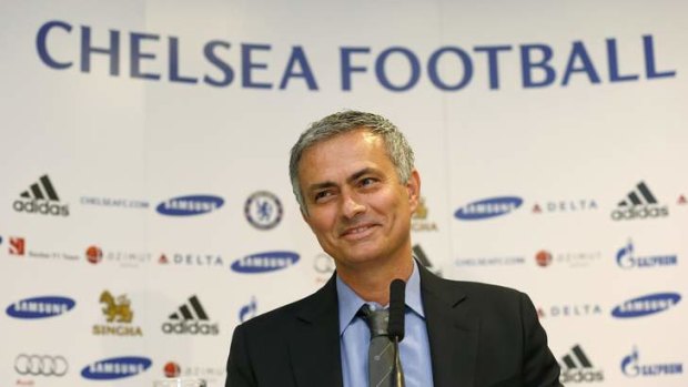 Happy Jose ... Jose Mourinho at his news conference at Stamford Bridge.