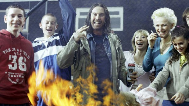 David Threlfall (centre) stars as Frank Gallagher in the British series of Paul Abbott's autobiographical  <i>Shameless</i>, which its creator says combines the brutality of life with tender humanity.