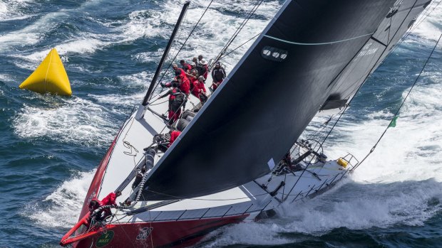 Smoking: Comanche at the start of the Rolex Sydney Hobart Yacht Race, December 26, 2014.