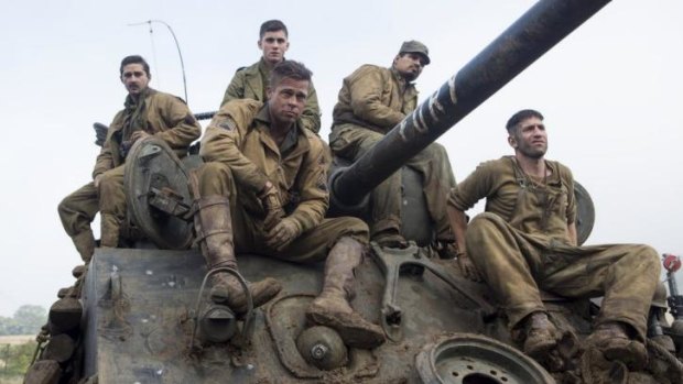 Shia LaBeouf, Logan Lerman, Michael Pena (at back), Brad Pitt and Jon Bernthal in David Ayer's WW2 drama <i>Fury</i>.