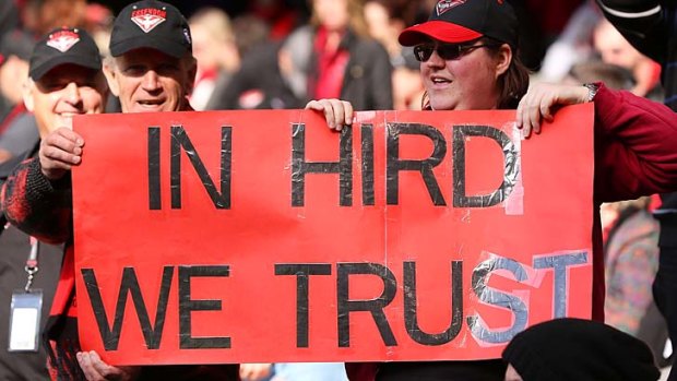 Bombers fans show their support for James Hird during the round 20 game against West Coast on Sunday.