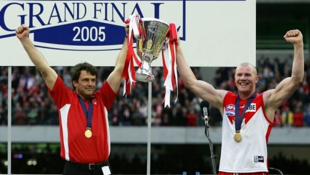 Breaking the drought: Paul Roos and Barry Hall hold the premiership trophy aloft in 2005.