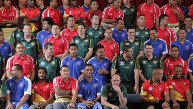 Say cheese ... Darren Lockyer with Tonga, Samoa and PNG players and Australian teammates at Parramatta Town Hall yesterday.