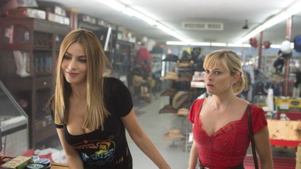 Daniella Riva (Sofia Vergara, left) and Officer Cooper (Reese Witherspoon) form a reluctant partnership in <i>Hot Pursuit</i>. 