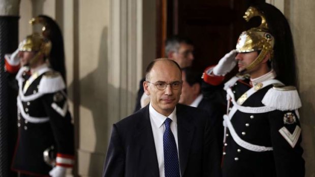 Nominated: Deputy leader of Italy's centre-left Democratic Party  Enrico Letta arrives at the Quirinale Palace in Rome.