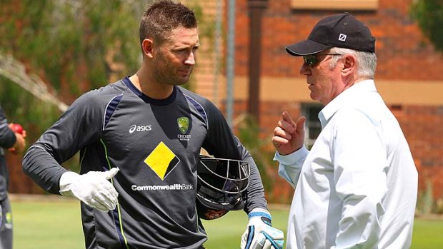 Michael Clarke and Allan Border talk during an Australian nets session at the Gabba on Tuesday.
