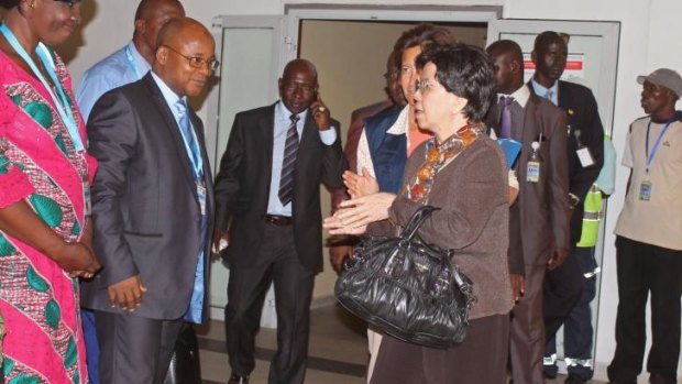  Director-General of the World Health Organisation Margaret Chan is greeted as she arrives in Conakry, Guinea.