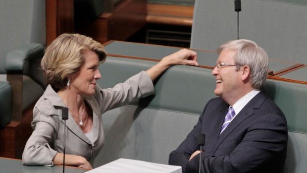 Relegated to the backbench, former foreign minister Kevin Rudd enjoys a joke with Deputy Opposition Leader Julie Bishop.
