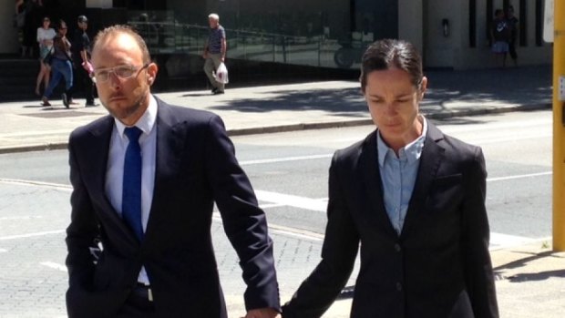 Robert Cunningham and wife Catherine Atoms outside the Perth District Court.