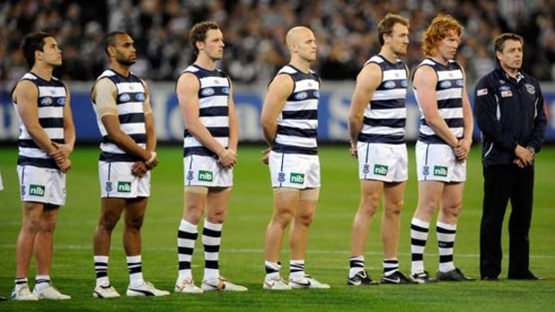 Stand up and be counted ... Mark Thompson, far right, in his previous life at Geelong. He can expect tough questioning about his defection at his first public appearance for Essendon.