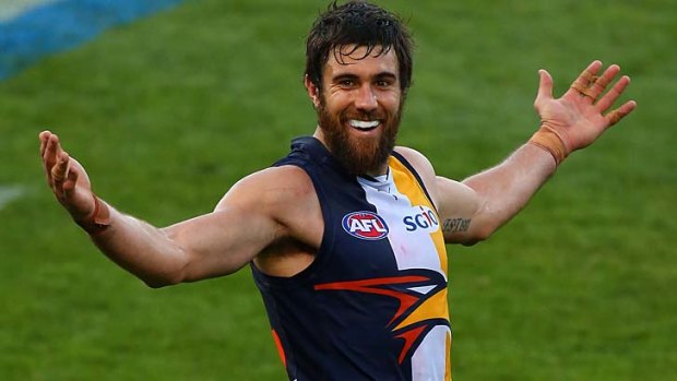Ten and counting: West Coast's Josh Kennedy has good reason to smile after kicking his 10th goal against the Giants on Sunday. He finished with 11 as the Eagles won by 111 points.