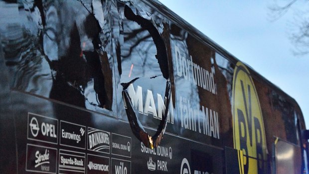 The window of Dortmund's team bus was damaged after an explosion.