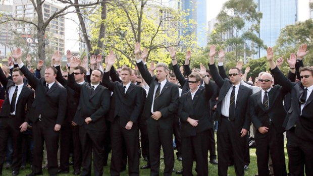 The black suits, white shirts  and team-issue black ties worn by the armed offenders squad imitated the violent criminals in the film  Reservoir Dogs, the OPI report says.