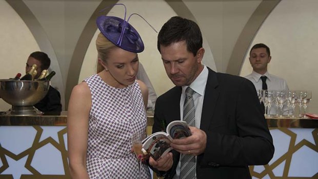That's how you handle retirement: Ex-Australian cricket captain Ricky Ponting and his wife Rianna in the Emirates marquee at Flemington on Melbourne Cup Day.