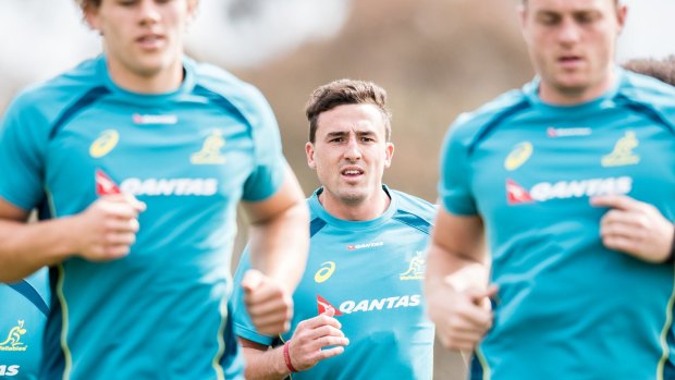 ACT Brumbies fullback Tom Banks has bolted into the Wallabies' training squad to replace Dane Haylett Petty. 