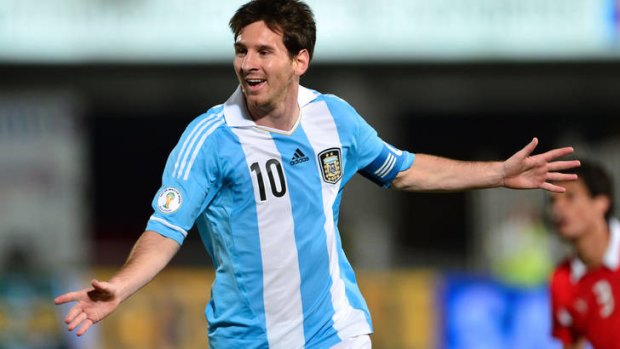 Lionel Messi celebrates after scoring against Chile.