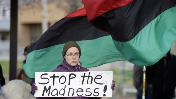 A demonstrator protests the shooting of Tamir Rice at Cudell Park in Cleveland.