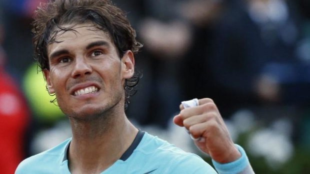 Rafael Nadal of Spain celebrates after defeating countryman David Ferrer.
