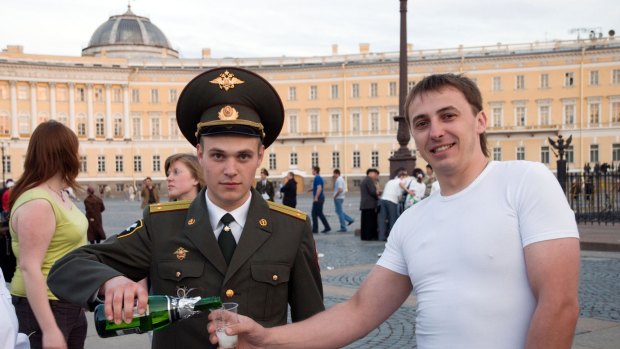 Never before seen in Australia: A policeman celebrates White Night in St Petersburg.
