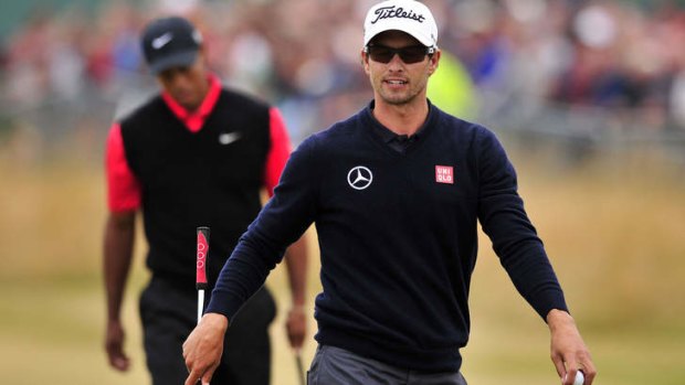 Neither Adam Scott (R) or Tiger Woods could mount a sustained challenge.