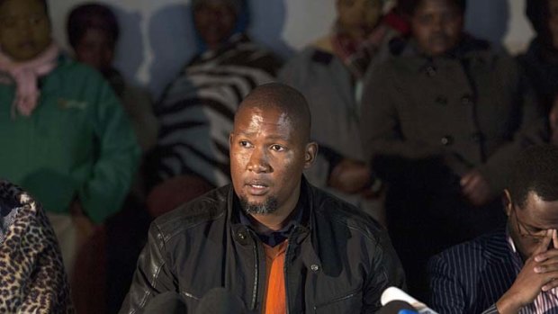 The grandson of ailing former South African President Nelson Mandela, Mandla Mandela, talks to journalists during a press conference at his home.