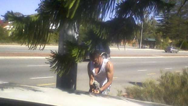 A picture snapped of Gagik Toumanian attacking the speed camera on West Coast Highway.