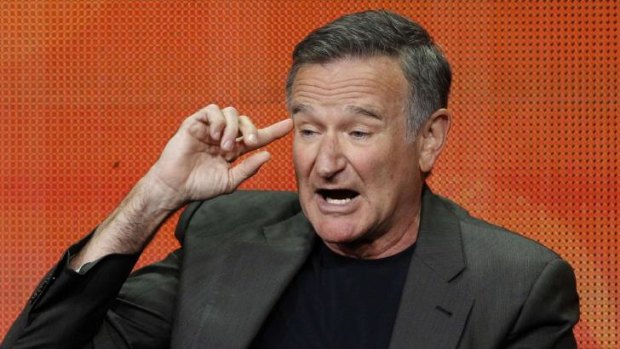 Conscience talking: Robin Williams, pictured speaking during a press tour last year, interviewed himself about suicide in a 2010 podcast.