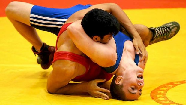 On the outer ... wrestling faces removal from Olympic Games.