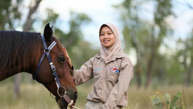 Indonesian animal husbandry student Safitri, 20, is taking part in an industry exchange program on Lakefield Station, Northern Territory.