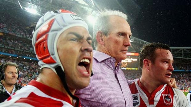 Glory days ... from left, Jamie Soward, Wayne Bennett and Dean Young savour the Dragons' grand final victory at ANZ Stadium last year.