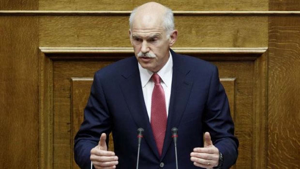 Hanging in the balance ... Greece's Prime Minister George Papandreou addresses parliament.