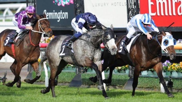 Courageous: Dissident (far right) holds off Fawkner to win the Makybe Diva Stakes. 