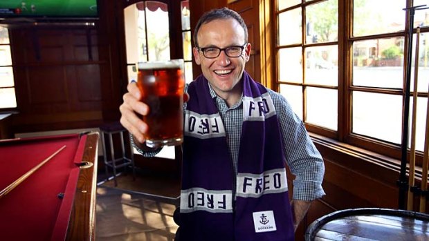 Adam Bandt celebrates Fremantle's spot in the Grand Final at the Great Northern Hotel.