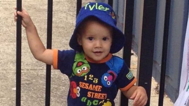 The two-year-old had unexpectedly jumped out of a car, into the path of his mother's car. She did not see him and reversed over him.
