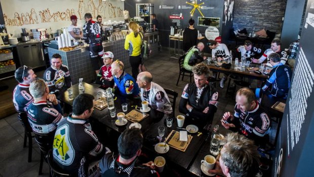 Cyclists drink morning coffees at Two Before Ten in the city.