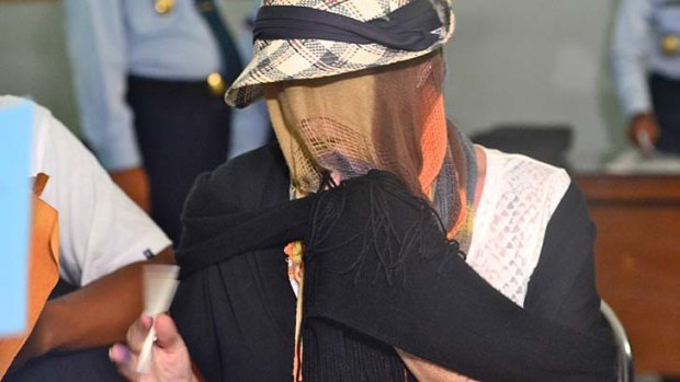 Controversial: Schapelle Corby covered her face when she was released.