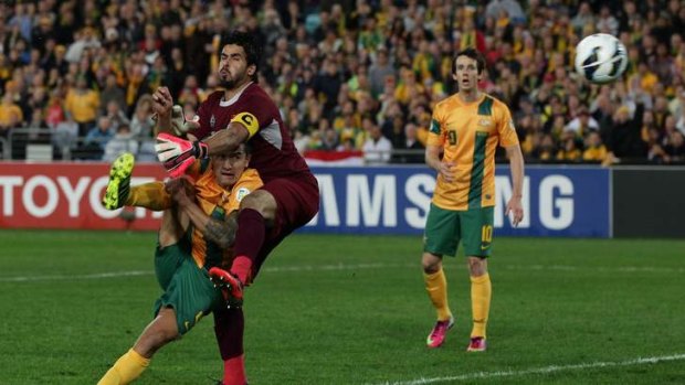 Frustration: Tim Cahill hooks a shot wide.