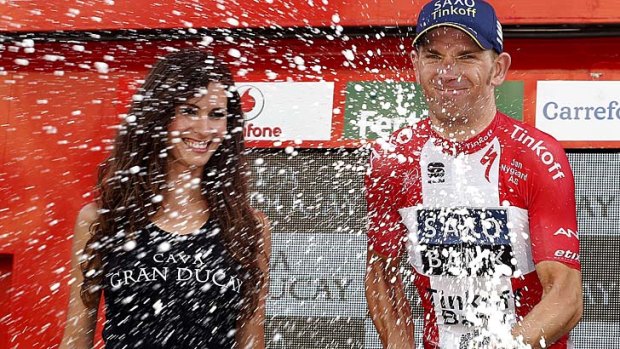 Denmark's Michael Morkov (Saxo) sprays cava from the podium after winning the sixth stage of the Tour of Spain.