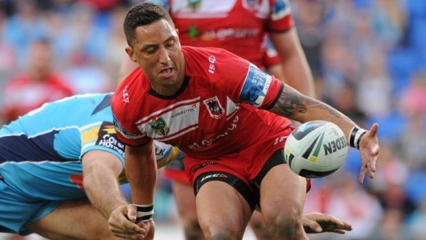 Happy Dragon: Benji Marshall juggles the ball during St George Illawarra's win over the Titans.
