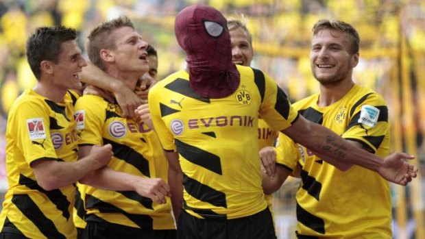 Time to celebrate: DOrtmund players celebrate their Cup win.