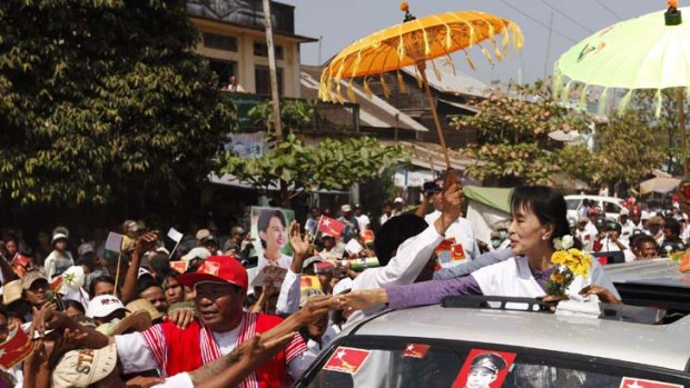 Democracy icon &#8230; Aung Sun Suu Kyi talks to supporters in Kawhmu yesterday.