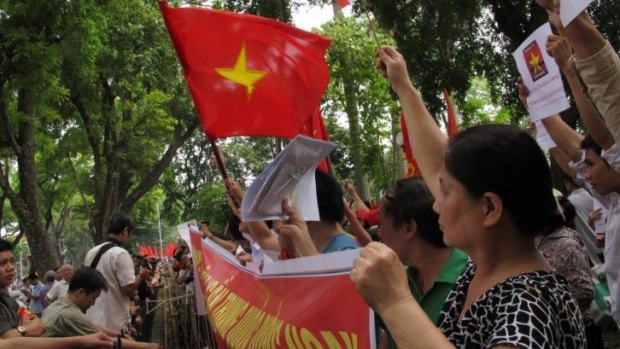 Anti-Chinese protesters in Vietnam rally against Beijing's deployment of an oil rig in the contested waters of the South China Sea.