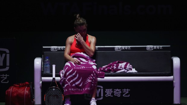 Simona Halep looks dejected after going down to Angelique Kerber.